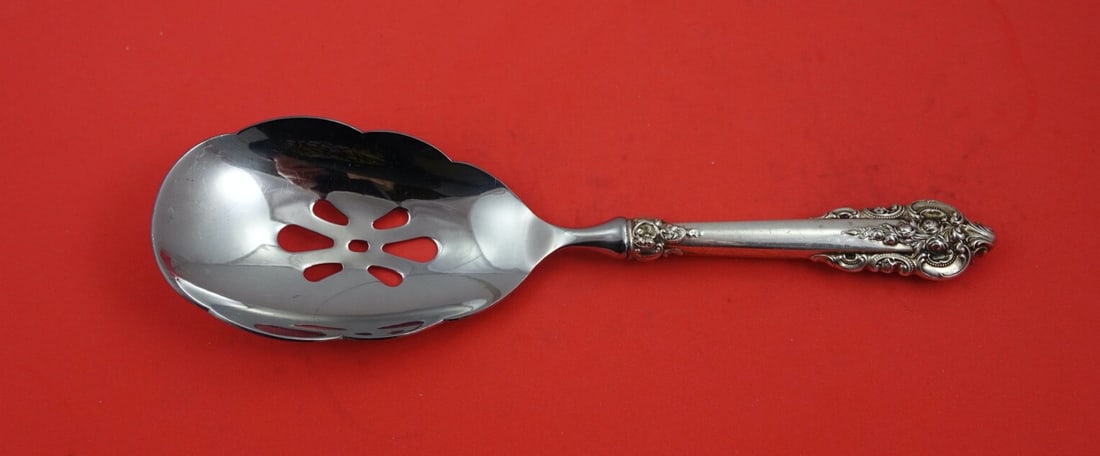 Wallace Grande Baroque Sterling Silver Pierced Serving Spoon 9 3/4": Wallace Grande Baroque Sterling Silver Pierced Serving Spoon 9 3/4" This elegant Grande Baroque serving spoon from Wallace is a stunning addition to any table setting. Crafted from high-quality sterli