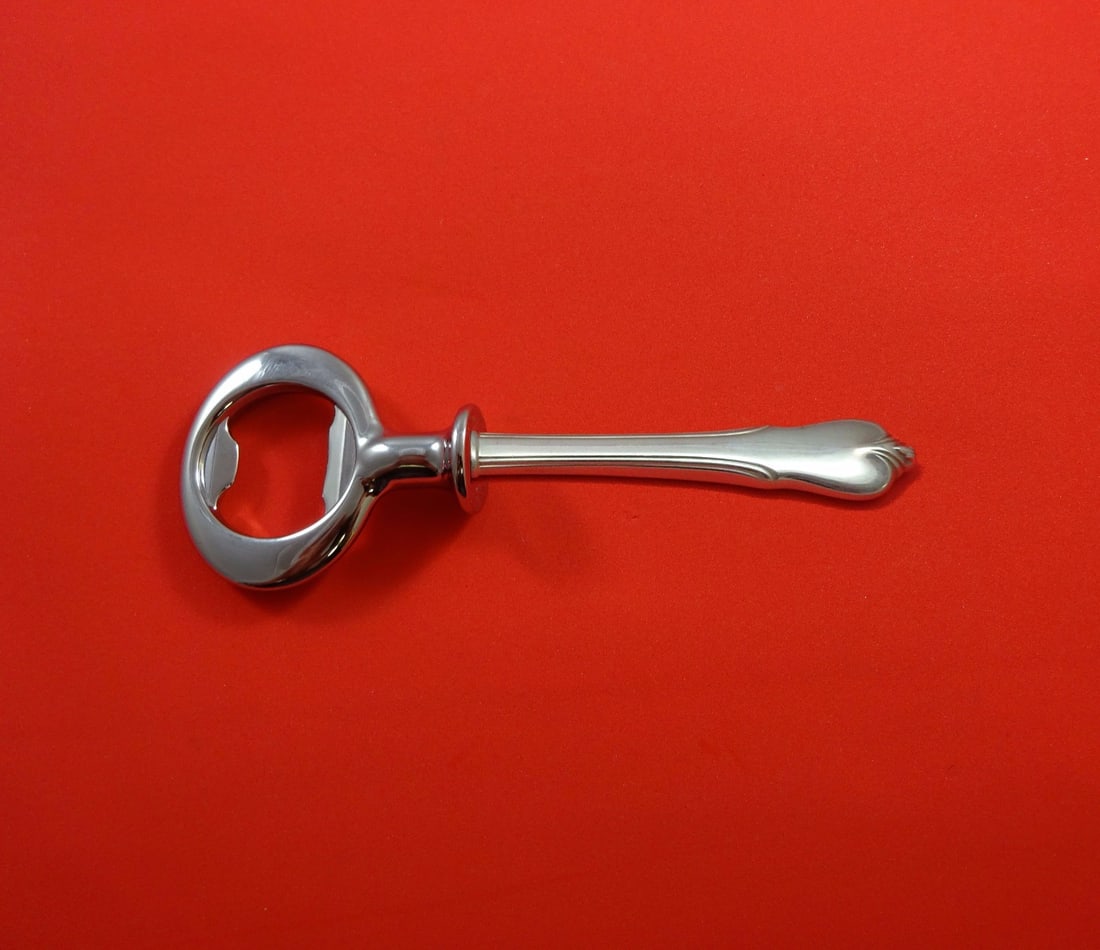 Wallace Grand Colonial Sterling Silver Bottle Opener Custom Made 6": Wallace Grand Colonial Sterling Silver Bottle Opener Custom Made 6" Introducing the Grand Colonial Bottle Opener by Wallace, a stunning piece crafted from sterling silver with a durable chrome plating