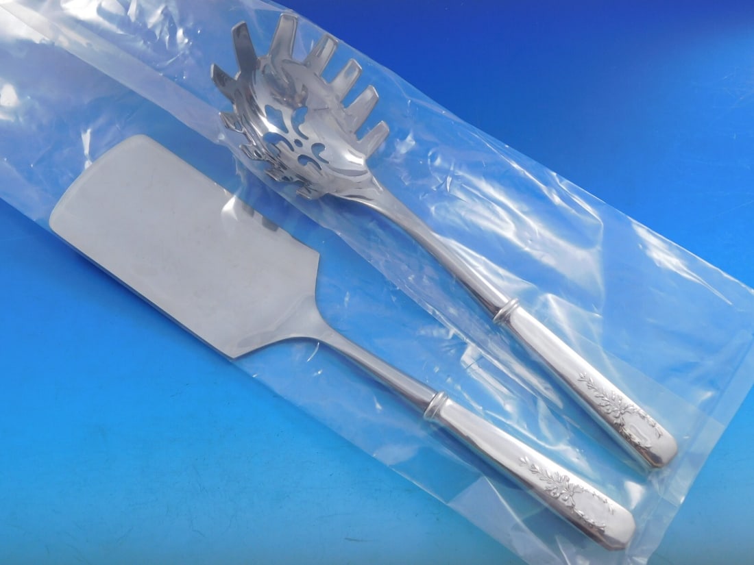 Whiting Madam Jumel Sterling Silver 2pc Pasta Server Set: Whiting Madam Jumel Sterling Silver 2pc Pasta Server Set Enhance your dining experience with this exquisite 2-piece Italian Pasta Server Set from the Madam Jumel pattern by Whiting. Crafted from high-