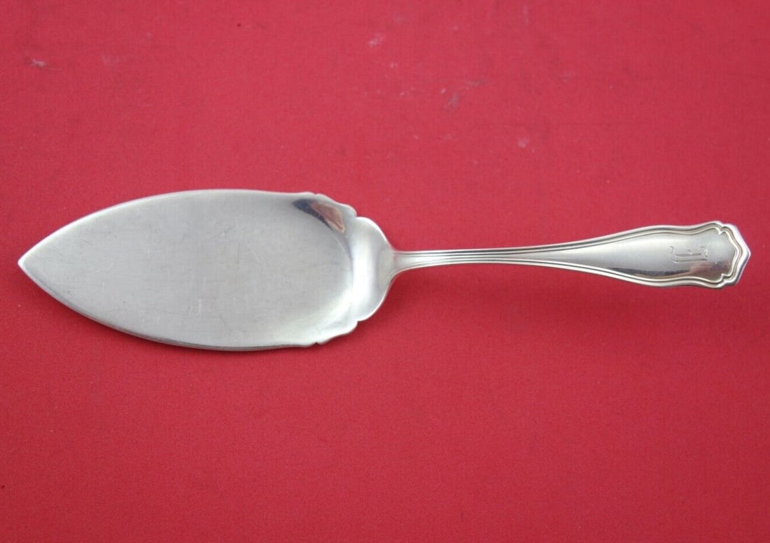 Shreve Sterling Silver Dolores Pastry Server 7 3/4 Inch Monogrammed: Shreve Sterling Silver Dolores Pastry Server 7 3/4 Inch Monogrammed Presenting the exquisite Dolores Pastry Server from Shreve, crafted entirely in sterling silver. This serving piece, measuring 7 3/4