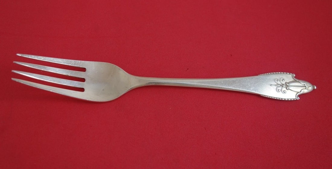 Georg Jensen Akkeleje Sterling Silver Dinner Fork 7 3/4": Georg Jensen Akkeleje Sterling Silver Dinner Fork 7 3/4" This exquisite dinner fork is part of the Akkeleje pattern by renowned Danish silversmith Georg Jensen. Crafted from high-quality sterling silv