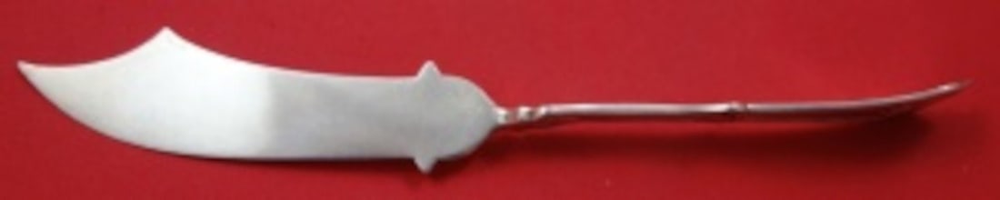 Schulz & Fischer Pacific Sterling Silver Master Butter Knife 7.75": Schulz & Fischer Pacific Sterling Silver Master Butter Knife 7.75" This exquisite 7 3/4" master butter knife features a flat twist handle and is crafted from high-quality sterling silver. Part of the