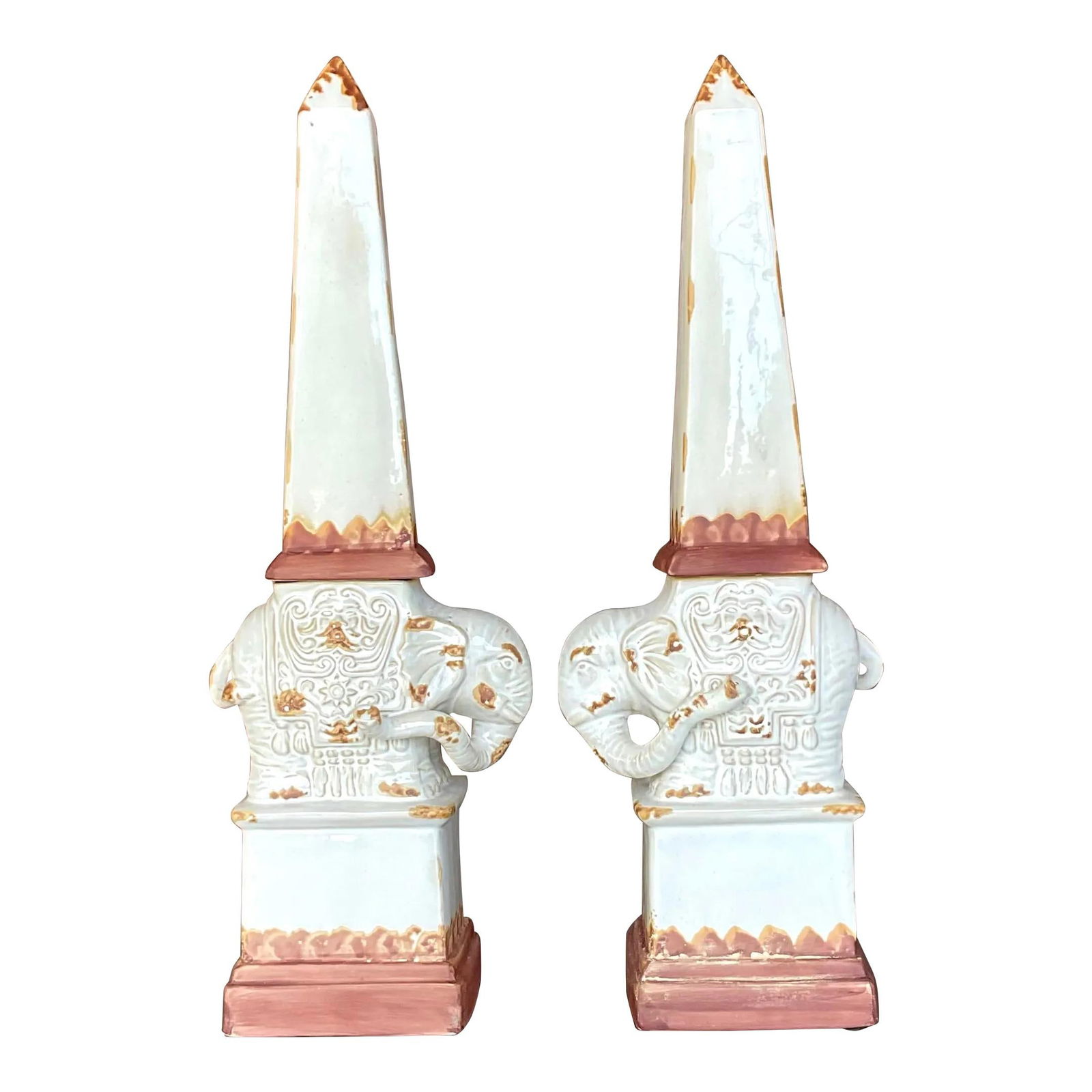 Charming Vintage Terra Cotta Elephant Obelisks Pair 20.5in: Charming Vintage Terra Cotta Elephant Obelisks Pair 20.5in This exquisite pair of vintage glazed terra cotta obelisks features a delightful elephant design, symbolizing good luck with their trunks rai