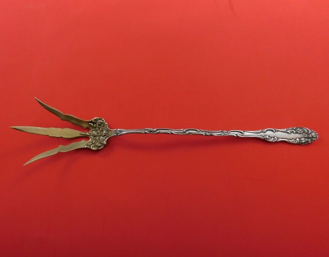 Towle Old English Sterling Silver Lettuce Fork Gold Wash 9.25 inches: Towle Old English Sterling Silver Lettuce Fork Gold Wash 9.25 inches This exquisite Old English lettuce fork is crafted from sterling silver and features a beautiful gold wash. Measuring 9 1/4 inches,