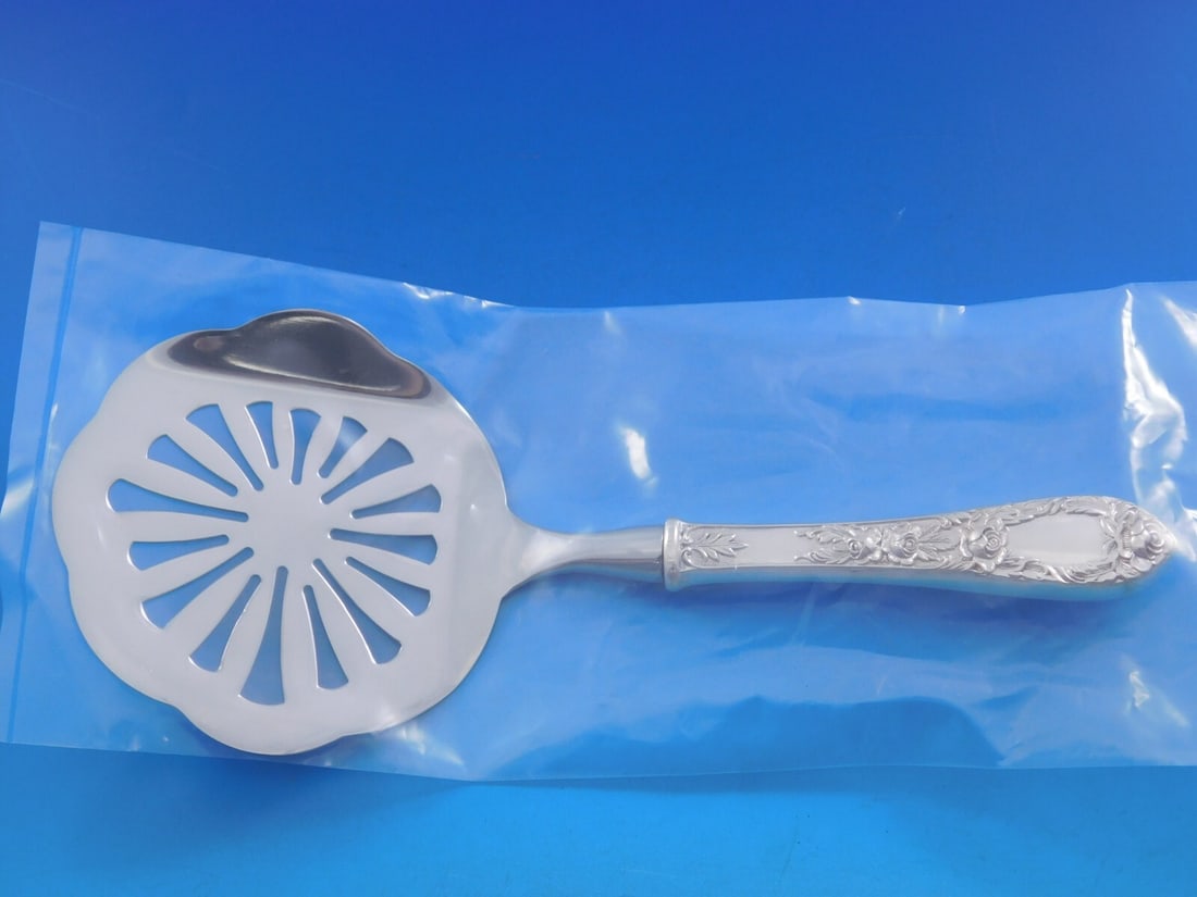 Kirk Rose Pattern Sterling Silver Tomato Server Custom Made 8.5": Kirk Rose Pattern Sterling Silver Tomato Server Custom Made 8.5" This exquisite tomato server from the Rose pattern by Kirk features a sterling silver hollow handle and a stainless implement, custom m