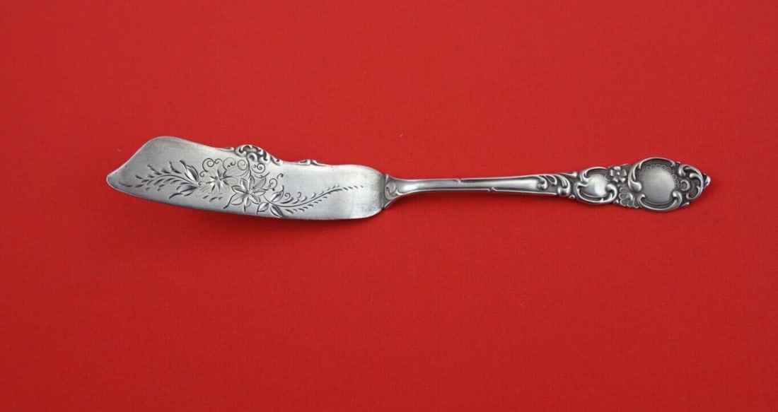 Towle Navarre Sterling Silver Master Butter Knife 7 1/8 Bright-Cut: Towle Navarre Sterling Silver Master Butter Knife 7 1/8 Bright-Cut This stunning Master Butter Knife is part of the Navarre pattern by Towle, crafted from high-quality sterling silver. The knife featu
