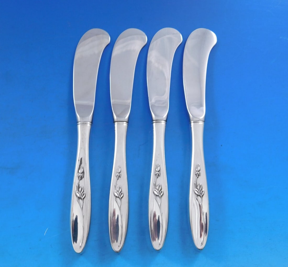 Towle Rose Solitaire Sterling Silver Butter Spreader Set of 4: Towle Rose Solitaire Sterling Silver Butter Spreader Set of 4 Enhance your dining experience with this exquisite set of 4 butter spreaders from the Rose Solitaire pattern by Towle. Crafted from high-q