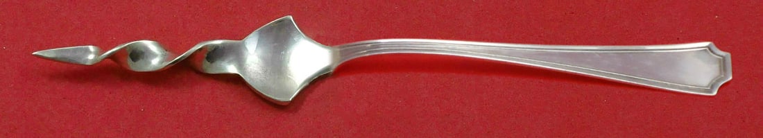 Durgin-Gorham Fairfax Sterling Silver Twisted Butter Pick 5 3/4": Durgin-Gorham Fairfax Sterling Silver Twisted Butter Pick 5 3/4" This exquisite butter pick is part of the Fairfax pattern by Durgin-Gorham, crafted from high-quality sterling silver. Measuring 5 3/4