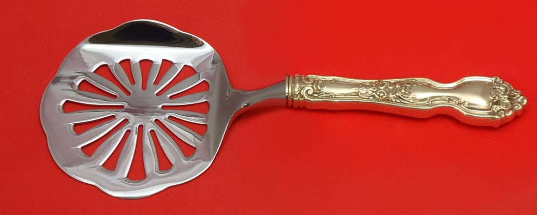 Wallace La Reine Sterling Silver Tomato Server Custom 8.5": Wallace La Reine Sterling Silver Tomato Server Custom 8.5" This exquisite tomato server from the La Reine pattern by Wallace is a stunning addition to any table setting. Crafted from high-quality ster