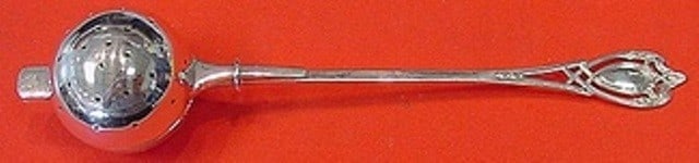 Lunt Monticello Sterling Silver Ball Tea Infuser Spoon 6.5": Lunt Monticello Sterling Silver Ball Tea Infuser Spoon 6.5" This Monticello by Lunt sterling silver tea infuser spoon features a charming ball-shaped design, measuring 6 1/2 inches. Crafted by Lunt, t