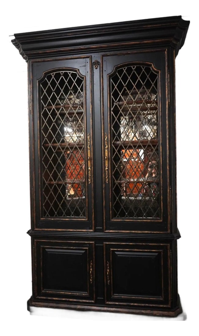 Marge Carson Monumental Black China Cabinet with Lighted Interior: Marge Carson Monumental Black China Cabinet with Lighted Interior This striking Monumental Black Painted Finish China Cabinet, crafted by Marge Carson, is a remarkable blend of style and functionality