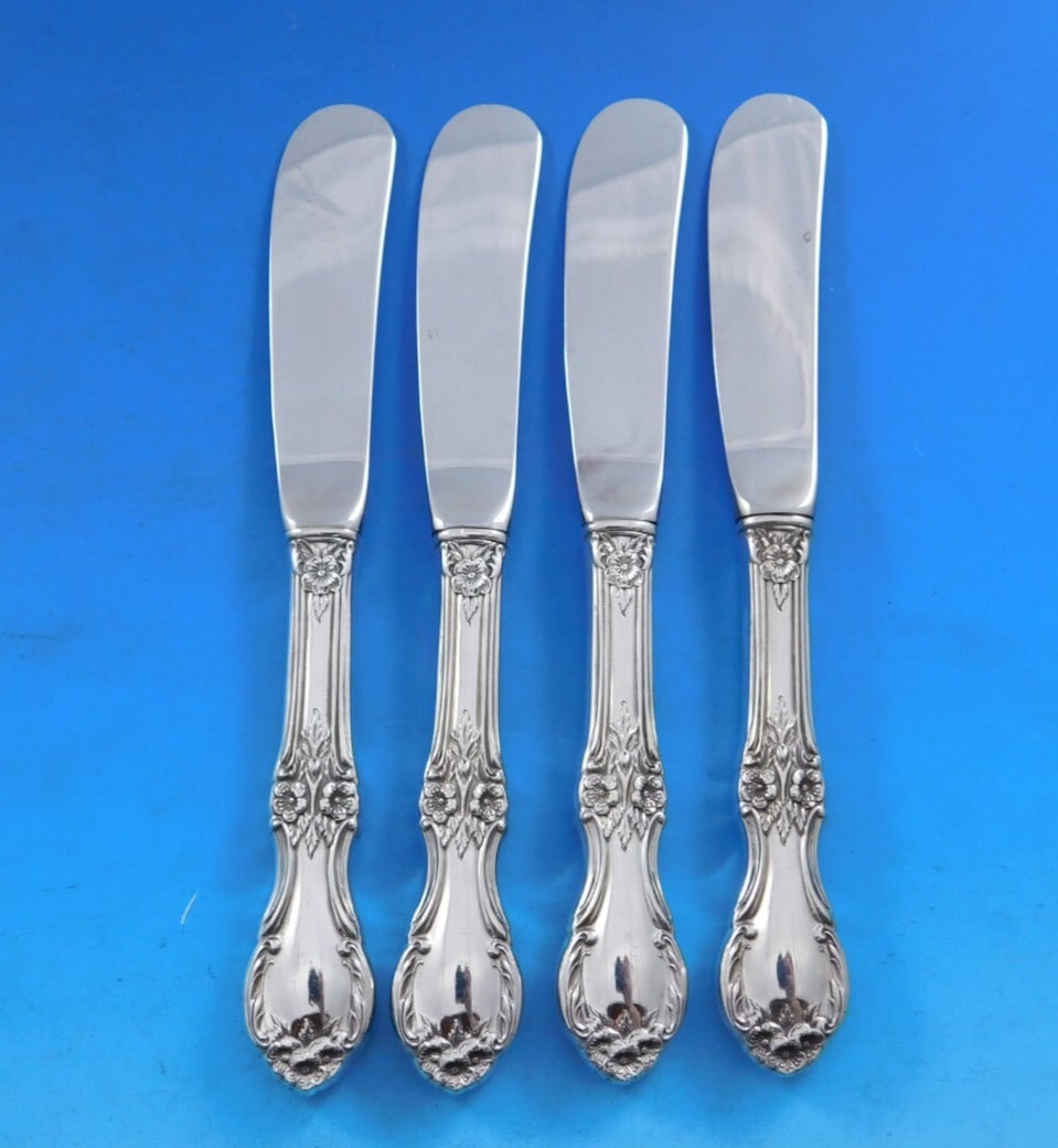 International Sterling Silver Wild Rose Butter Spreader Set 4 pcs 5 7/8": International Sterling Silver Wild Rose Butter Spreader Set 4 pcs 5 7/8" Enhance your dining experience with this exquisite set of four butter spreaders from the Wild Rose pattern by International Ste