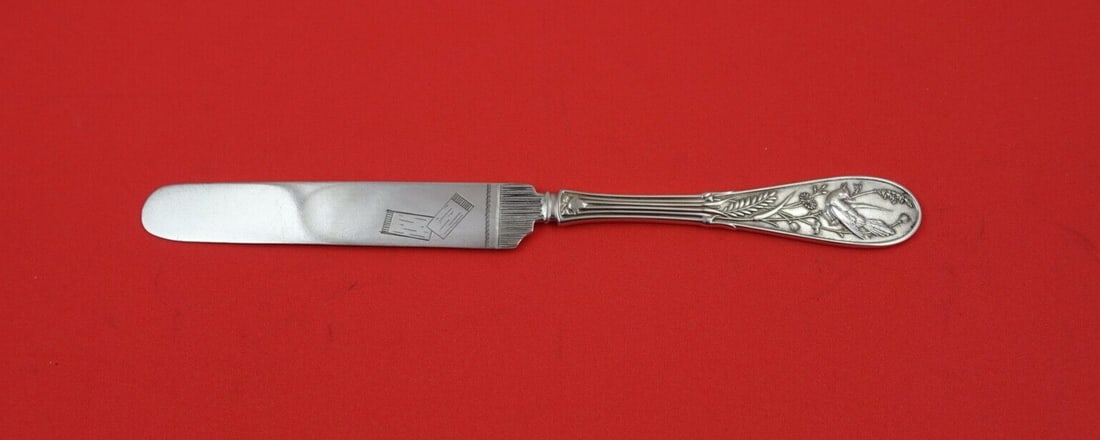 Tiffany & Co Japanese Sterling Silver Dessert Knife 7 1/4" with Design Blade: Tiffany & Co Japanese Sterling Silver Dessert Knife 7 1/4" with Design Blade This exquisite dessert knife is part of the Japanese pattern by Tiffany & Co., crafted from sterling silver. Measuring 7 1/