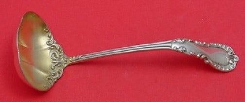 Reed & Barton Majestic Sterling Silver Goldwashed Sauce Ladle 5.5 Inch: Reed & Barton Majestic Sterling Silver Goldwashed Sauce Ladle 5.5 Inch This elegant sauce ladle from the Majestic pattern by Reed & Barton is crafted from high-quality sterling silver with a beautiful