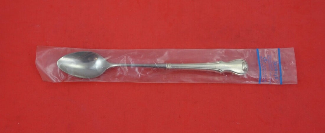 Wallace Plymouth Colony Sterling Silver Iced Tea Spoon 7 3/4": Wallace Plymouth Colony Sterling Silver Iced Tea Spoon 7 3/4" Add a touch of elegance to your dining experience with the Plymouth Colony iced tea spoon by Wallace. Crafted from high-quality sterling s