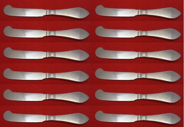 Georg Jensen Continental Sterling Silver Butter Spreader Set of 12: Georg Jensen Continental Sterling Silver Butter Spreader Set of 12 Enhance your dining experience with this exquisite set of 12 butter spreaders from the renowned Continental pattern by Georg Jensen.