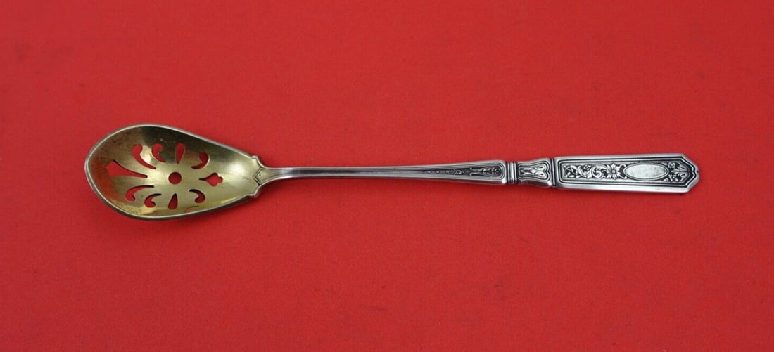 Gorham Saint Dunstan Chased Sterling Silver Olive Spoon 5 3/4 inches: Gorham Saint Dunstan Chased Sterling Silver Olive Spoon 5 3/4 inches This exquisite serving spoon features the Saint Dunstan Chased pattern by Gorham, crafted from high-quality sterling silver. Measur