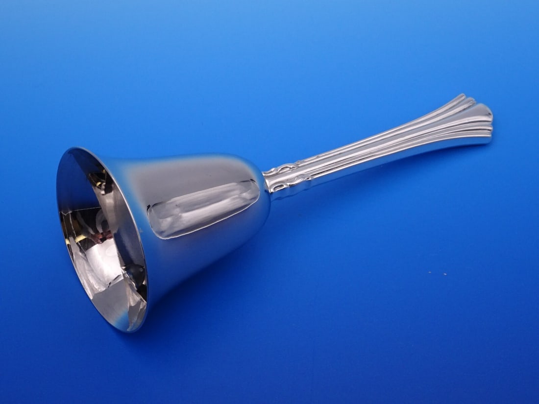 Reed & Barton Eighteenth Century Sterling Silver Dinner Bell 7 Inch: Reed & Barton Eighteenth Century Sterling Silver Dinner Bell 7 Inch This exquisite dinner bell from Reed & Barton is part of the Eighteenth Century pattern, showcasing timeless elegance. Made of sterl