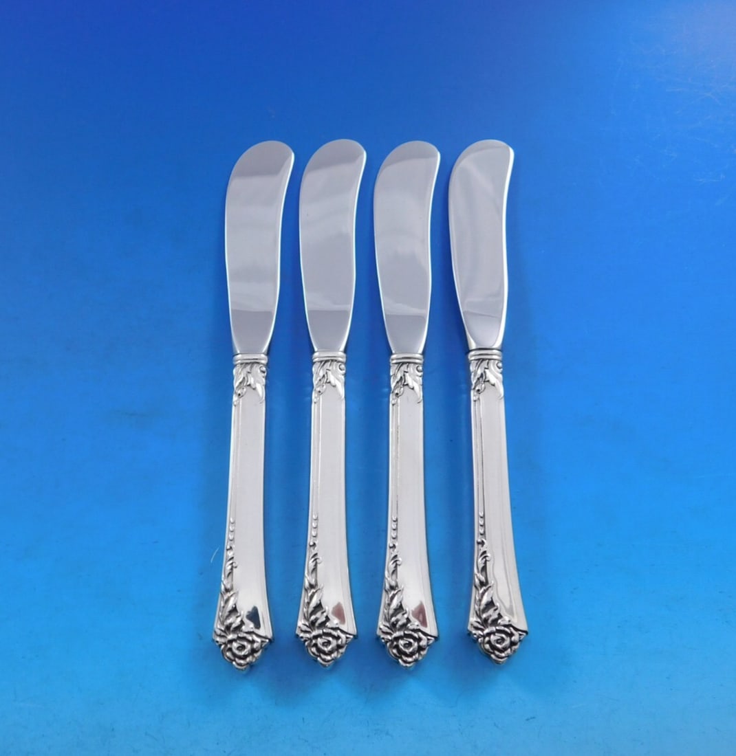 Oneida Damask Rose Sterling Silver Butter Spreader Set 4pcs 6 1/4in: Oneida Damask Rose Sterling Silver Butter Spreader Set 4pcs 6 1/4in Enhance your dining experience with this elegant set of 4 butter spreaders from Oneida, featuring the exquisite Damask Rose pattern.