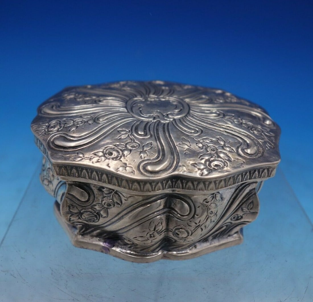 Gebruder Dingeldein Sterling Silver Oval Box Rococo Design: Gebruder Dingeldein Sterling Silver Oval Box Rococo Design This exquisite oval box, crafted from sterling silver by Gebruder Dingeldein in Hanau, Germany, showcases a beautiful scalloped design comple