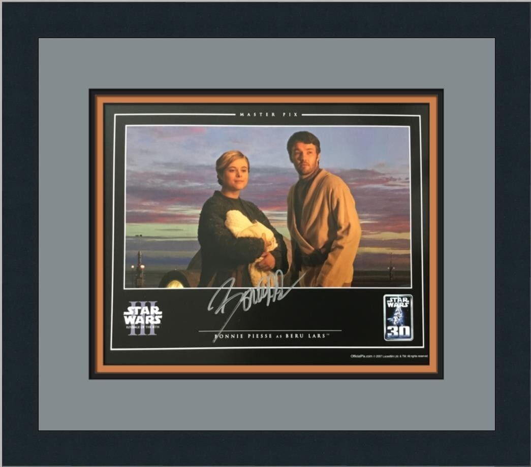Star Wars III Beru Lars Signed Photo Custom Framed by Bonnie Piesse: Star Wars III Beru Lars Signed Photo Custom Framed by Bonnie Piesse This officially licensed Star Wars III cardstock photograph features Beru Lars, portrayed by Bonnie Piesse, and is authenticated by