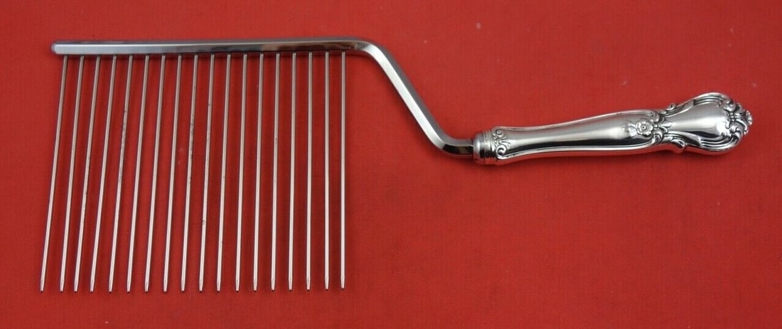 Weidlich Ancestry Sterling Silver Cake Breaker 10 1/2 inches: Weidlich Ancestry Sterling Silver Cake Breaker 10 1/2 inches This exquisite cake breaker from the Ancestry pattern by Weidlich is a stunning addition to any serving collection. Crafted from sterling s