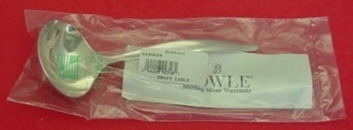 Towle Contour Sterling Silver Gravy Ladle 6.5 Inch: Towle Contour Sterling Silver Gravy Ladle 6.5 Inch This exquisite gravy ladle is crafted from high-quality sterling silver and features the elegant Contour pattern by Towle. Measuring 6 1/2 inches, it