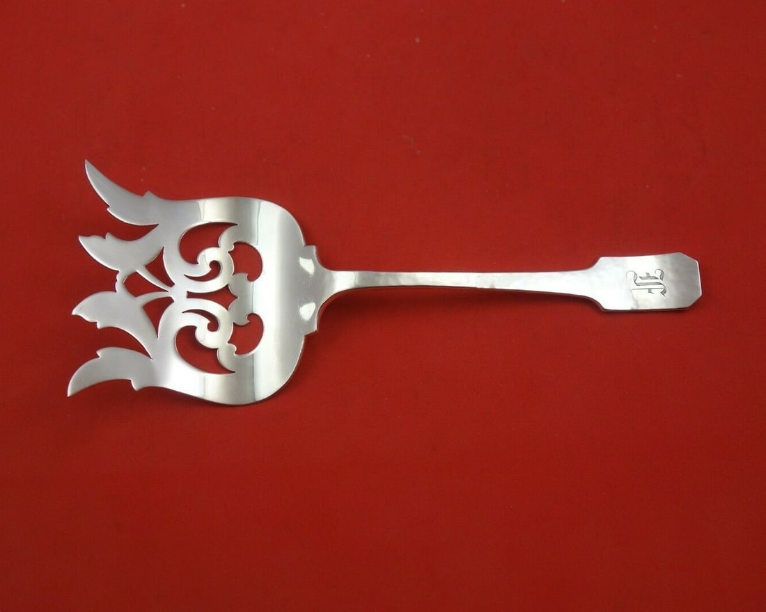 Shreve Norman Hammered Sterling Silver Asparagus Fork with Engraved Monogram: Shreve Norman Hammered Sterling Silver Asparagus Fork with Engraved Monogram This exquisite asparagus fork is crafted in sterling silver by Shreve, featuring the elegant Norman Hammered pattern. Measu