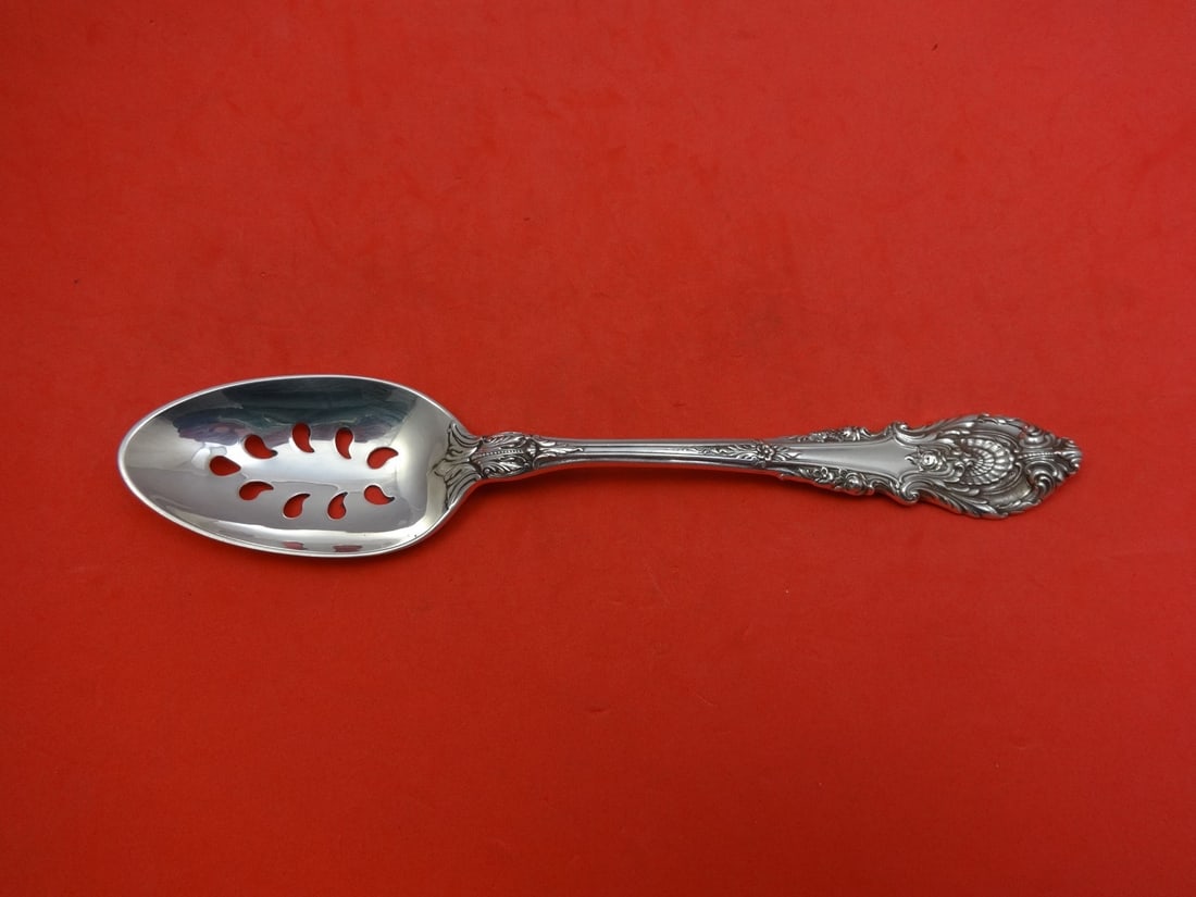 Wallace Sir Christopher Sterling Silver Slotted Spoon 9-Hole Custom 8.5": Wallace Sir Christopher Sterling Silver Slotted Spoon 9-Hole Custom 8.5" Elevate your dining experience with this exquisite Sir Christopher serving spoon by Wallace. This custom-made slotted spoon fea