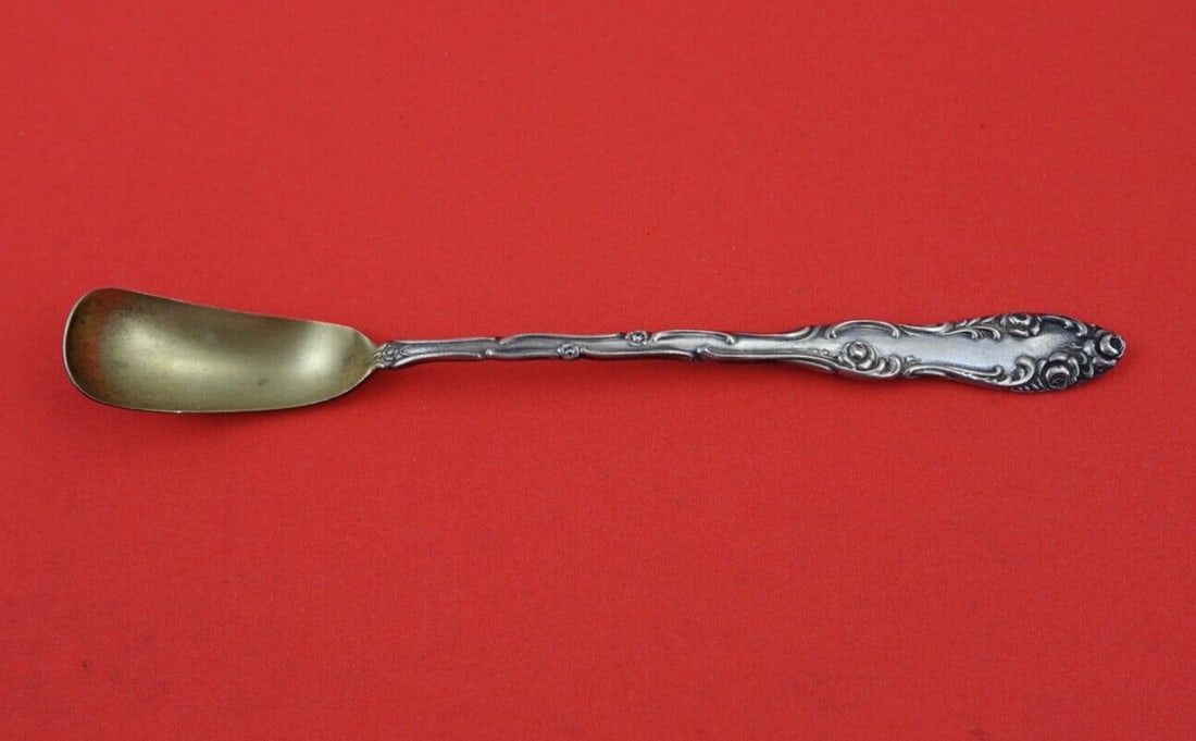 Towle Old English Sterling Silver Horseradish Scoop Gold Wash 6 1/4": Towle Old English Sterling Silver Horseradish Scoop Gold Wash 6 1/4" Discover the timeless elegance of the Old English horseradish scoop by Towle, crafted from premium sterling silver. This exquisite