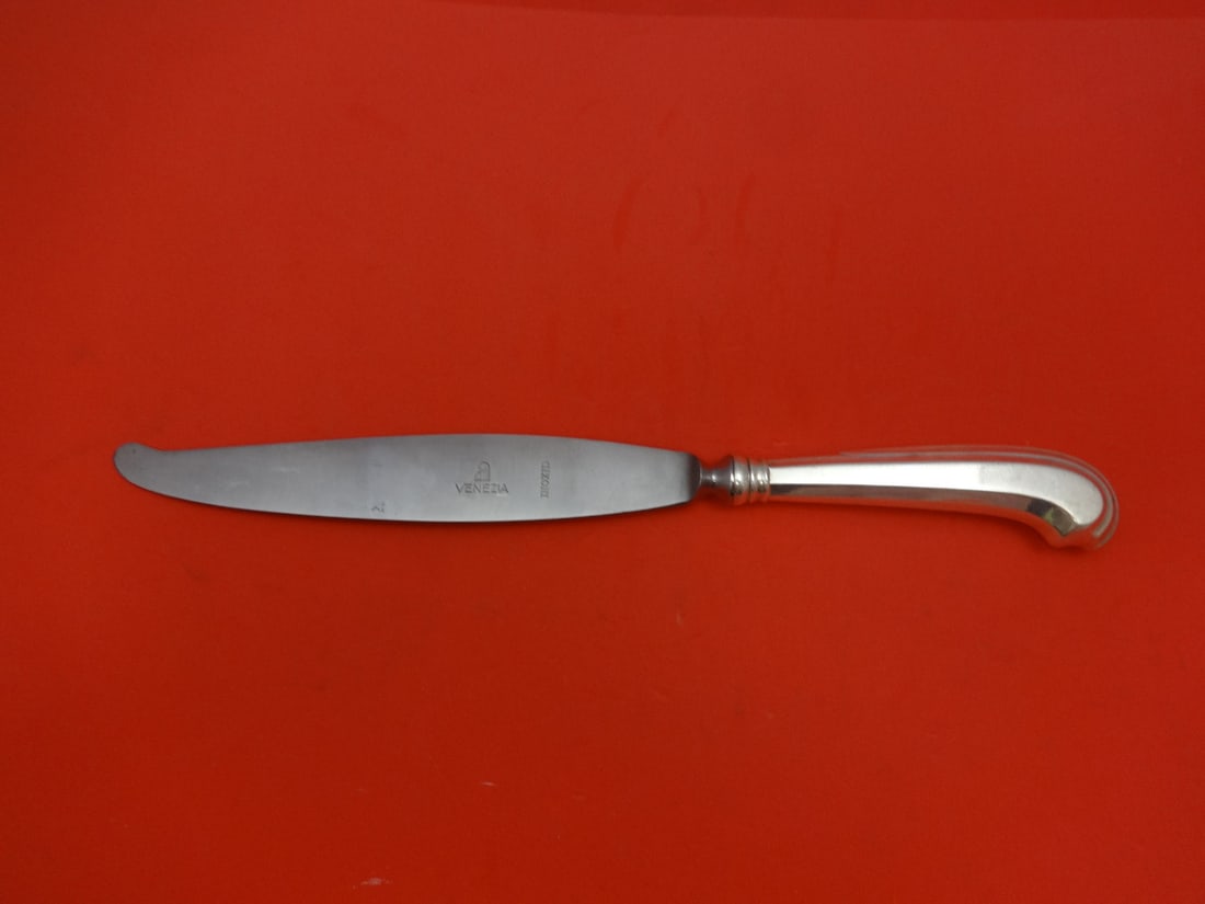 Saint Mark Italian Sterling Silver 10 Inch Dinner Knife Pistol Grip: Saint Mark Italian Sterling Silver 10 Inch Dinner Knife Pistol Grip Introducing the exquisite Saint Mark dinner knife, crafted from high-quality sterling silver. Featuring a distinctive pistol grip de