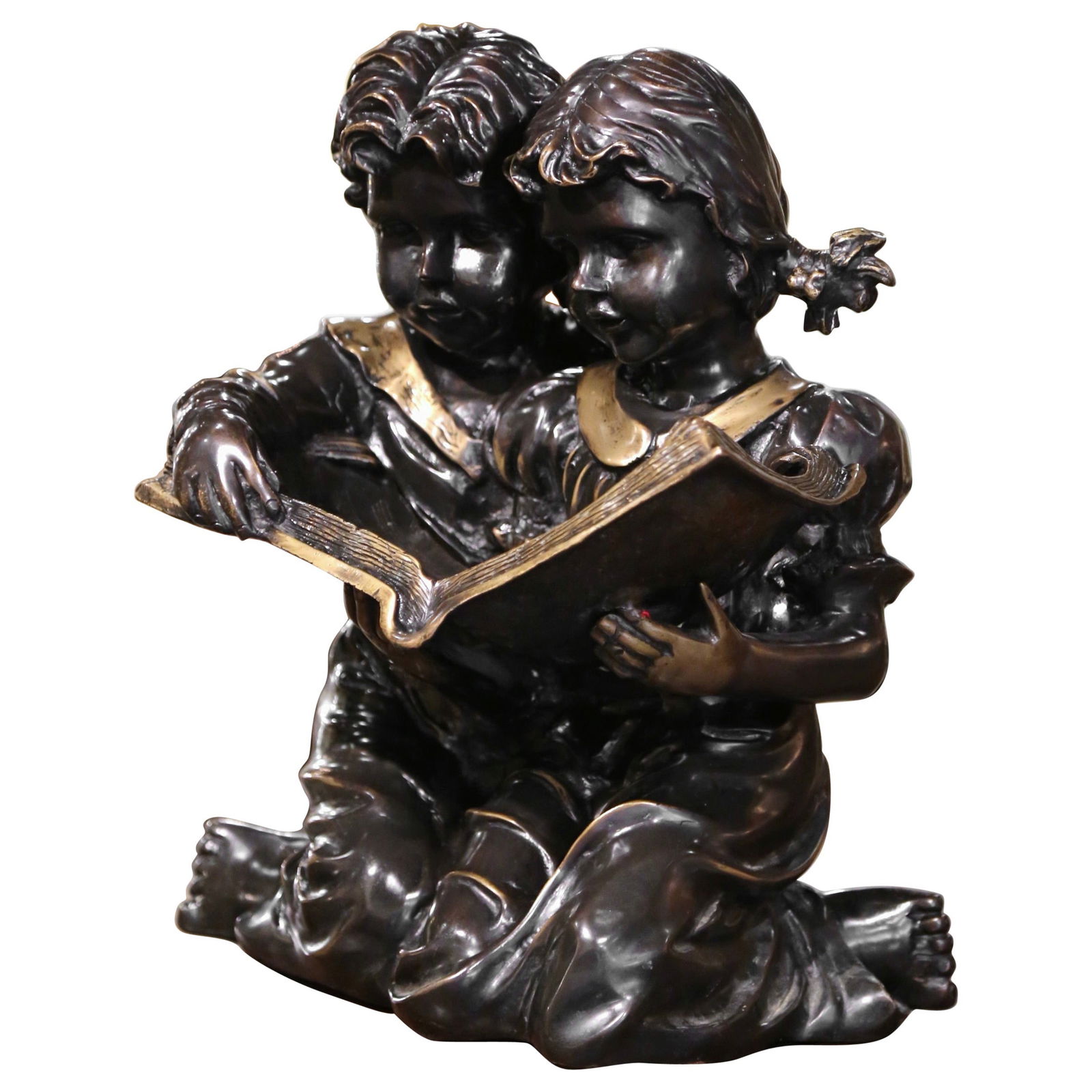 19th Century French Bronze Sculpture Children Reading Book Gilt Patinated: 19th Century French Bronze Sculpture Children Reading Book Gilt Patinated This exquisite 19th Century French two-tone bronze sculpture titled "Children Reading Book" captures a heartwarming scene of t