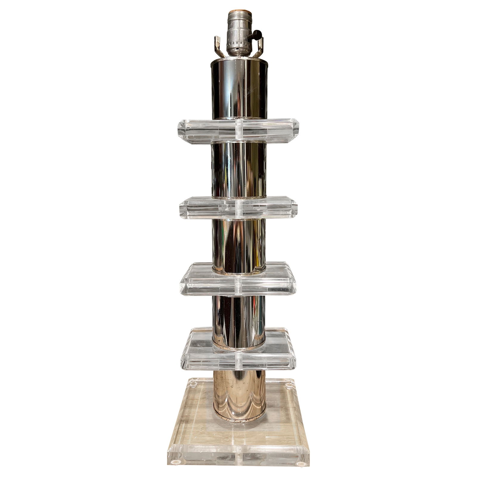 Mid Century Modern Tiered Lucite and Chrome Table Lamp United States: Mid Century Modern Tiered Lucite and Chrome Table Lamp United States This vintage Mid-Century Modern table lamp features a distinctive design with stacked and tiered Lucite blocks separated by chrome
