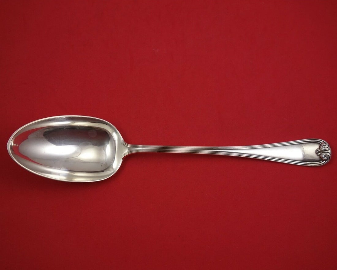 Durgin New Standish Sterling Silver Stuffing Spoon 11.5 Inch: Durgin New Standish Sterling Silver Stuffing Spoon 11.5 Inch This exquisite stuffing spoon features the elegant New Standish pattern by Durgin. Crafted from high-quality sterling silver, this piece da