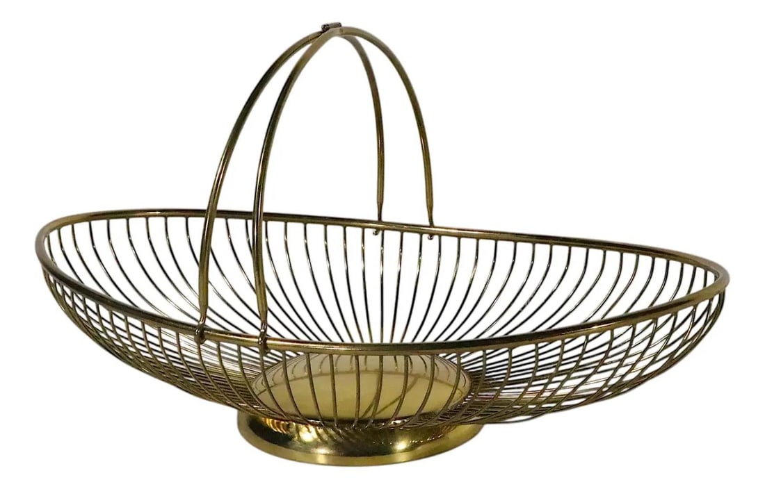 Italian Brass Wire Handled Bread Basket Oval Vintage Midcentury Hollywood Regency: Italian Brass Wire Handled Bread Basket Oval Vintage Midcentury Hollywood Regency This Hollywood Regency bread basket, crafted in Italy circa 1950s to 1970s, features a chic wirework design in polishe