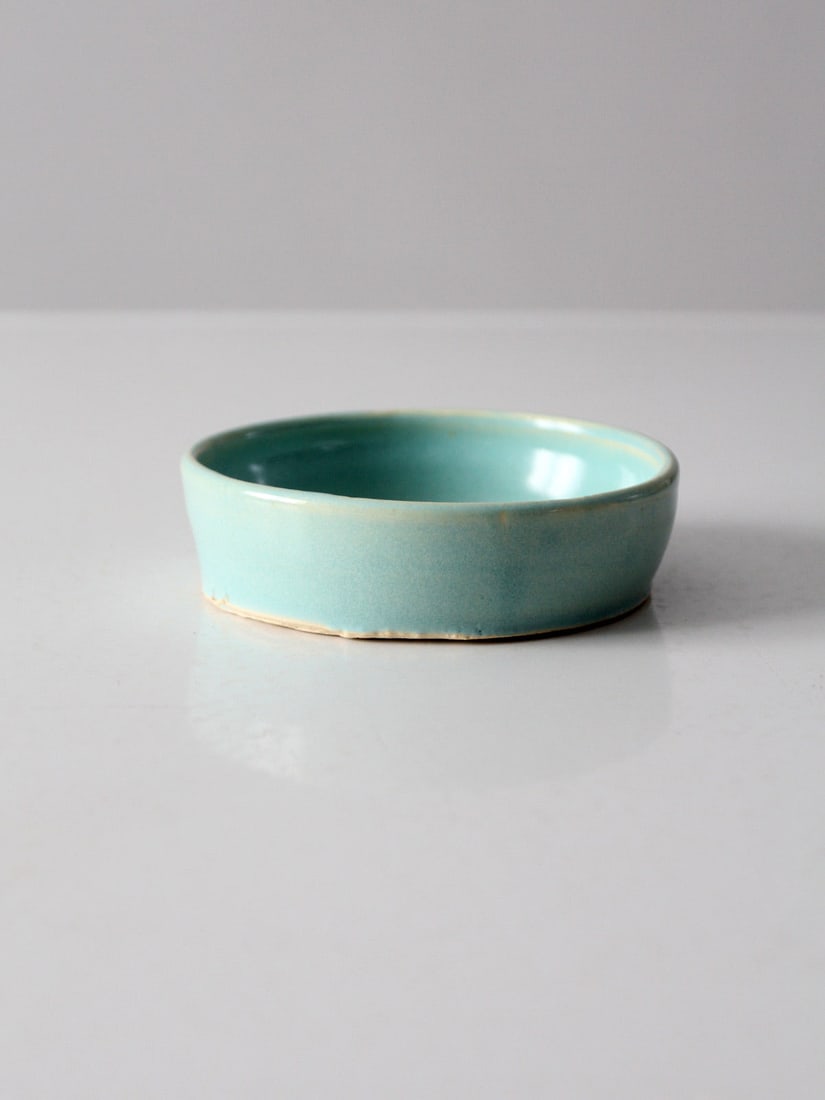 Signed Vintage Studio Pottery Bowl Soft Turquoise Glaze 5.25 Inch: Signed Vintage Studio Pottery Bowl Soft Turquoise Glaze 5.25 Inch This vintage studio pottery bowl showcases the artistry of its creator with a hand-crafted design and a stunning soft turquoise glaze.