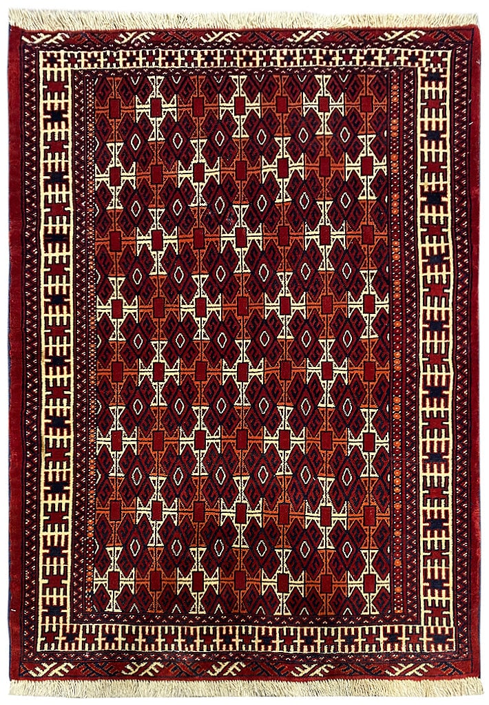 3'10" x 5' Handwoven Russian Kazak Rug with Vibrant Geometric Patterns: 3'10" x 5' Handwoven Russian Kazak Rug with Vibrant Geometric Patterns Free continental US Shipping Introducing a captivating 3' 10" x 5' All Over Pattern Russian Kazak Rug, a true masterpiece of trad