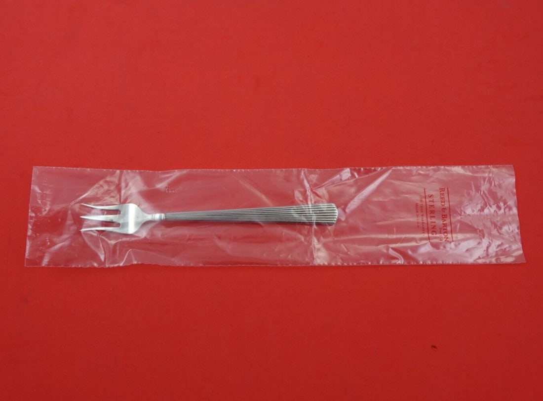 Reed and Barton Ashmont Sterling Silver Cocktail Fork 5.5 Inch New: Reed and Barton Ashmont Sterling Silver Cocktail Fork 5.5 Inch New Introducing the Ashmont cocktail fork by Reed and Barton, a timeless piece crafted from sterling silver. Measuring 5 1/2 inches, this