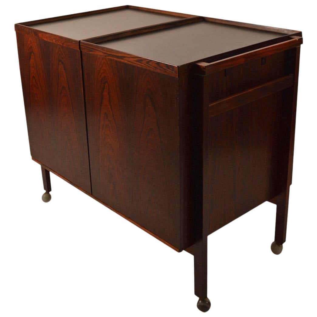 Niels Erik Glasdam Jensen Danish Rosewood Storage Cart 52": Niels Erik Glasdam Jensen Danish Rosewood Storage Cart 52" This exquisite Danish rosewood cart, designed by Niels Erik Glasdam Jensen, showcases the elegance of mid-century modern design. Crafted from