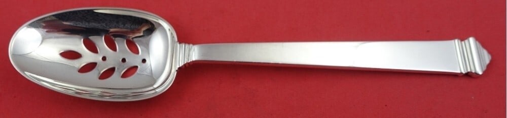 Tiffany & Co Hampton Sterling Silver Pierced Serving Spoon 8.75": Tiffany & Co Hampton Sterling Silver Pierced Serving Spoon 8.75" Elevate your dining experience with this exquisite Hampton by Tiffany & Co. sterling silver pierced serving spoon. Crafted with precisi