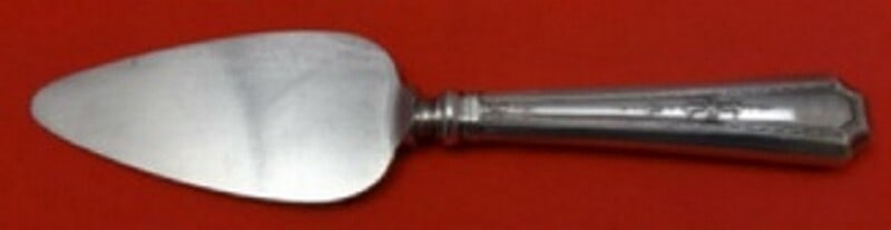 Durgin-Gorham Colfax Sterling Silver Cheese Server 6.5 Inch: Durgin-Gorham Colfax Sterling Silver Cheese Server 6.5 Inch Presenting the Colfax Cheese Server by Durgin-Gorham, a beautiful serving piece crafted from sterling silver with a silverplate blade. This