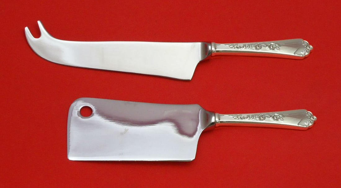 Wallace Sterling Rose 2PC Cheese Server Set Custom Hollow Handle: Wallace Sterling Rose 2PC Cheese Server Set Custom Hollow Handle Enhance your dining experience with this exquisite Sterling Rose by Wallace 2-piece cheese serving set. Crafted from high-quality sterl