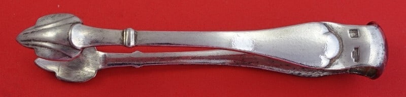 Puiforcat Cardinal Silverplate Sugar Tong 4 3/4 Inch Serving Piece: Puiforcat Cardinal Silverplate Sugar Tong 4 3/4 Inch Serving Piece Elevate your dining experience with the Cardinal Silverplate Sugar Tong by Puiforcat. Measuring 4 3/4 inches, this exquisite serving