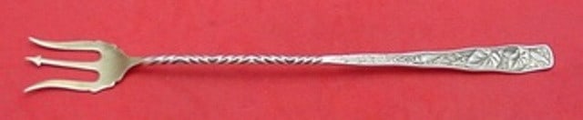 Towle Sterling Silver Orchids Long Twisted Pickle Fork 8 1/8": Towle Sterling Silver Orchids Long Twisted Pickle Fork 8 1/8" This elegant serving fork features the beautiful Orchids pattern by Towle, crafted from high-quality sterling silver. Measuring 8 1/8