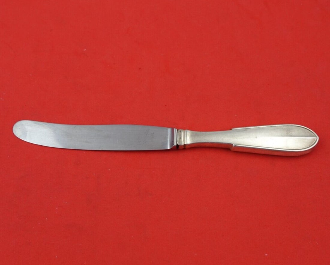 Hans Hansen Arvesolv #1 Sterling Silver Butter Spreader 6 3/4": Hans Hansen Arvesolv #1 Sterling Silver Butter Spreader 6 3/4" Enhance your dining experience with this exquisite butter spreader from Hans Hansen's Arvesolv #1 pattern. Crafted from sterling silver,