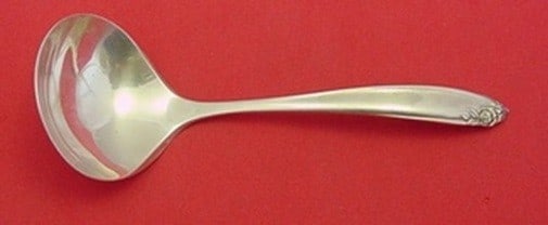 Sterling Silver Gravy Ladle Debutante Pattern by Wallace 6.375 Inch: Sterling Silver Gravy Ladle Debutante Pattern by Wallace 6.375 Inch This is a Sterling silver gravy ladle in the Debutante pattern by Wallace. Made in the United States after 1940, this piece features