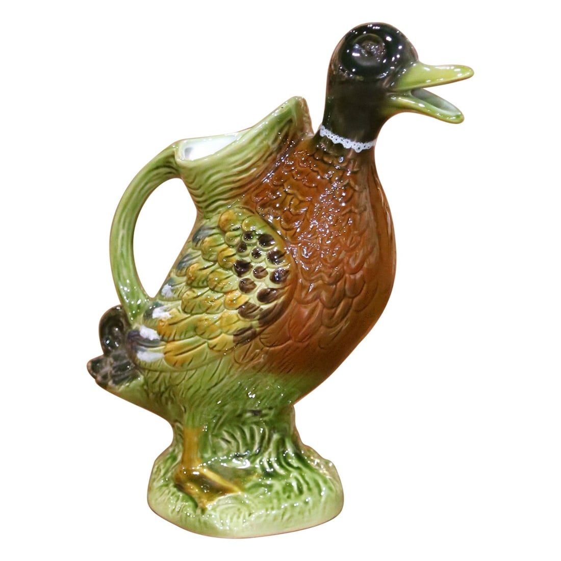 French Majolica Ceramic Mallard Duck Water Jug Hand Painted Circa 1960: French Majolica Ceramic Mallard Duck Water Jug Hand Painted Circa 1960 This mid-20th century French barbotine ceramic pitcher is crafted in the form of a standing mallard duck. Hand-painted and richly
