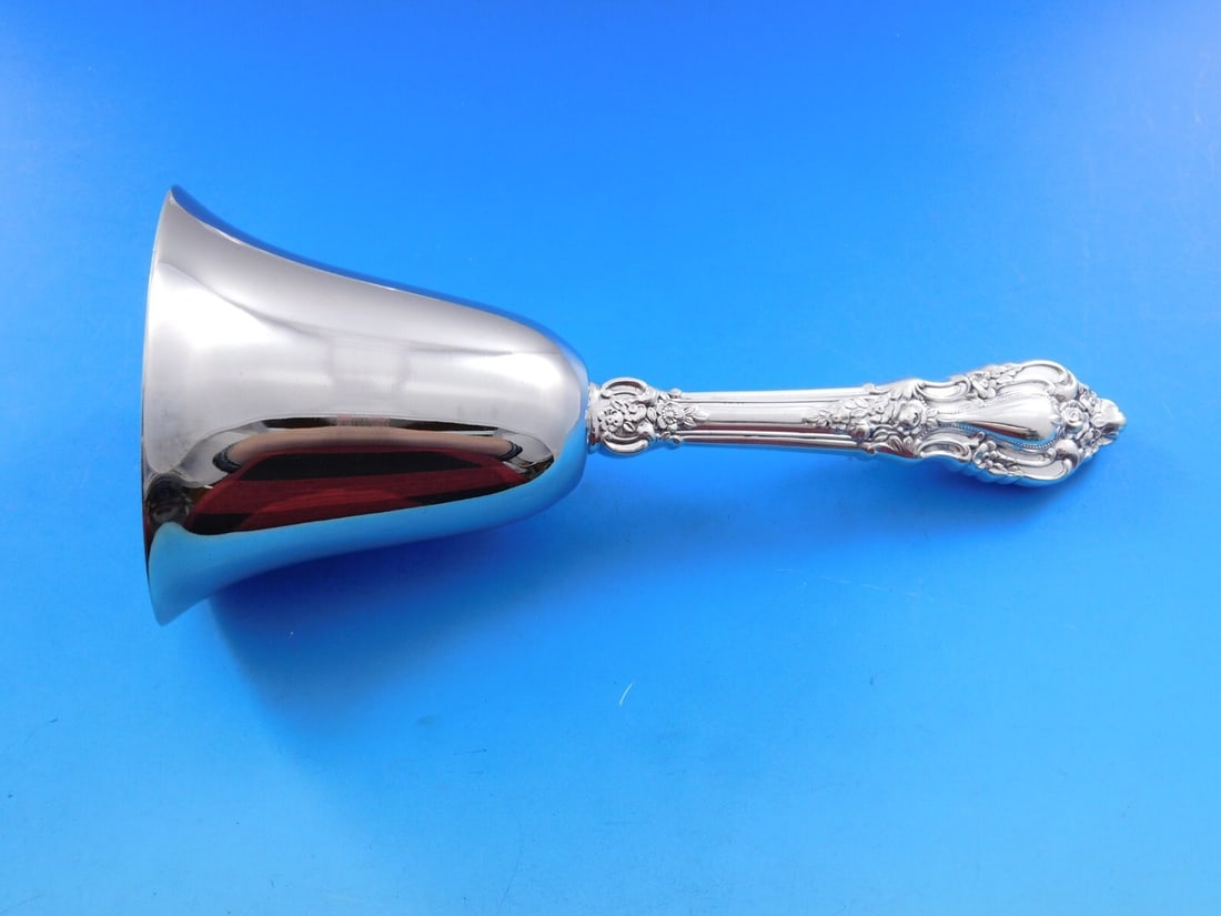 Lunt Eloquence Sterling Silver 7" Custom Dinner Bell: Lunt Eloquence Sterling Silver 7" Custom Dinner Bell This exquisite dinner bell from the Eloquence pattern by Lunt is crafted from sterling silver with a custom-made hollow handle and features a durab