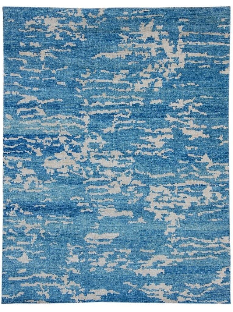 5'2 x 7' Olympic Blue Handmade Modern Transitional Rug: 5'2 x 7' Olympic Blue Handmade Modern Transitional Rug Free continental US Shipping The 5' 2" x 7' Olympic Blue Transitional Modern Rug is an elegant addition to any room, combining classic and contem