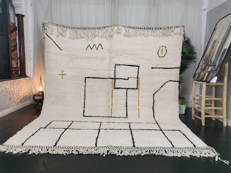 Authentic Handmade Moroccan Berber Rug 100% Sheep Wool: Authentic Handmade Moroccan Berber Rug 100% Sheep Wool This authentic soft white handmade Moroccan Berber rug is a stunning addition to any space. Crafted by skilled local Berber women weavers in the